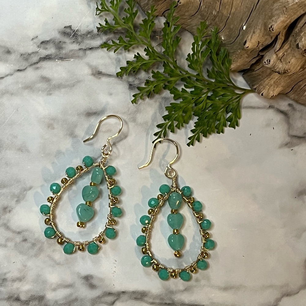 Gold tone and aqua teardrop dangle earrings